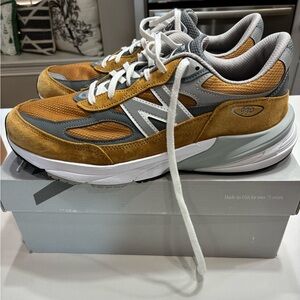 Men’s New Balance 990 shoes.
They are made in the United States.